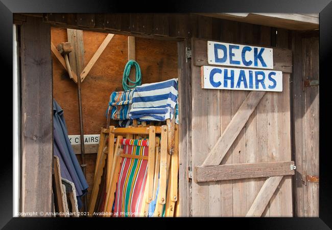 Deck chairs - seaside still life Framed Print by Amanda Hart