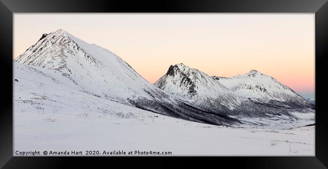 Winter Sun over Norwegian mountains Framed Print by Amanda Hart