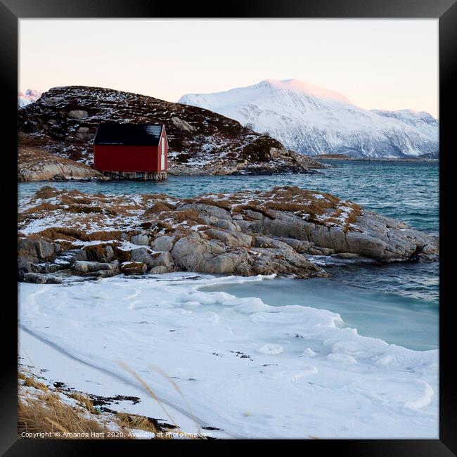 Red hut by the sea, winter in Norway Framed Print by Amanda Hart