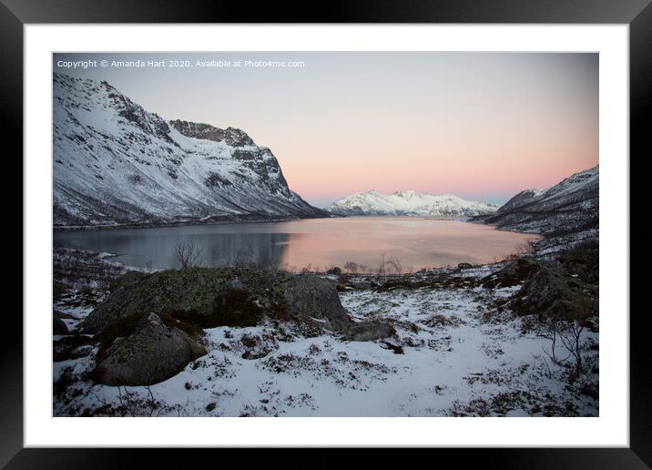 Winter sun over a fjord in Norway Framed Mounted Print by Amanda Hart
