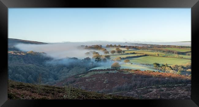 Mist clearing the fields of Cloutsham Farm, Exmoor National Park Framed Print by Shaun Davey