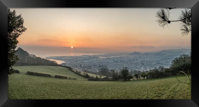 Colourful winter sunrise over Minehead Framed Print by Shaun Davey