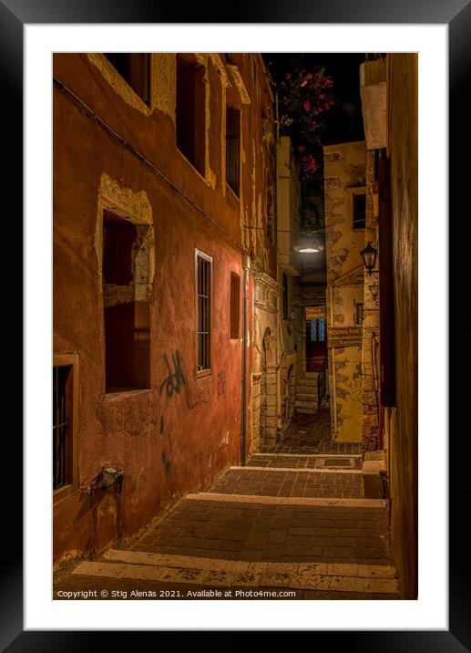 The creepy Moschon alley in the middle of the night lit by a str Framed Mounted Print by Stig Alenäs