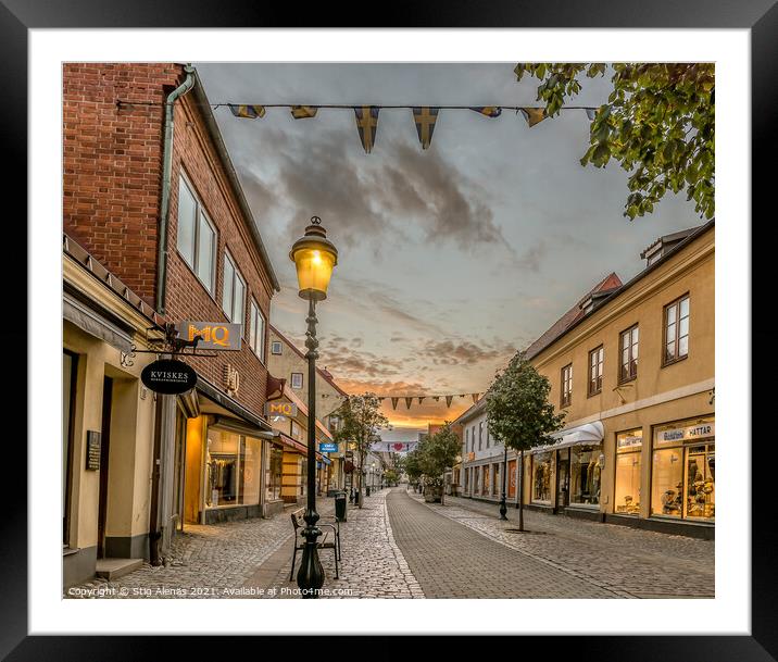 pedestrian shopping street in Ystad with a streetlight an early  Framed Mounted Print by Stig Alenäs