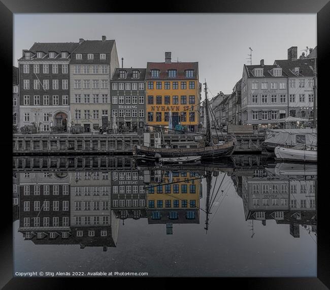 Nyhavn 17 is a famous yellow house at the Nyhavn canal in Copenh Framed Print by Stig Alenäs