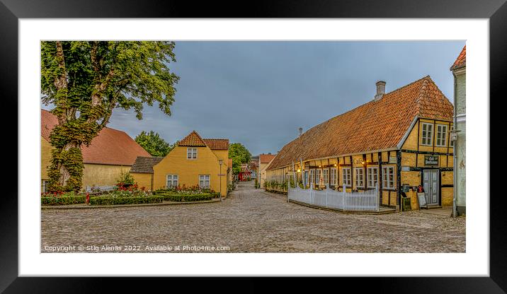 Panoramic wiev of a cobbelstone square and the old timber framed Framed Mounted Print by Stig Alenäs