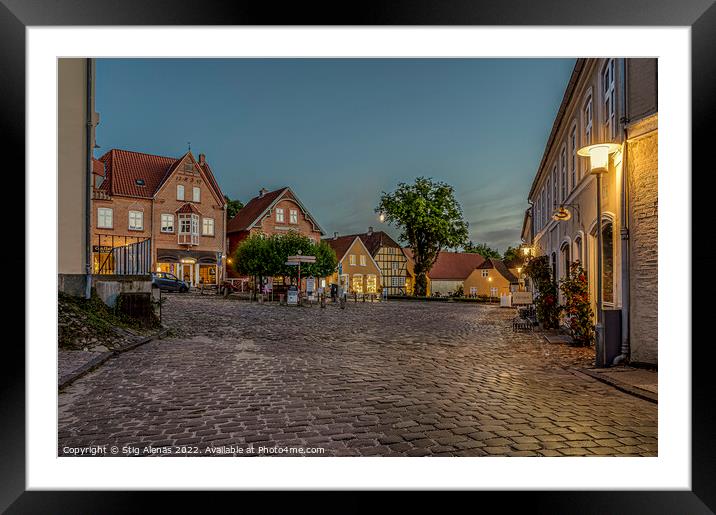 the illuminated square in the small Danish town of Mariager duri Framed Mounted Print by Stig Alenäs