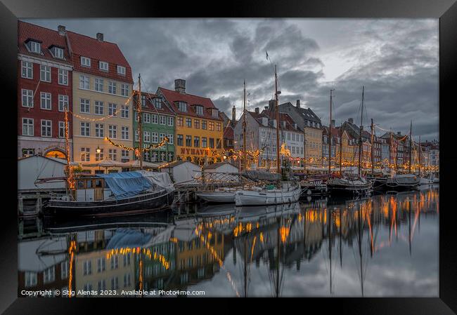 Fishing boats among glittering Christmas decorations in Copenhag Framed Print by Stig Alenäs