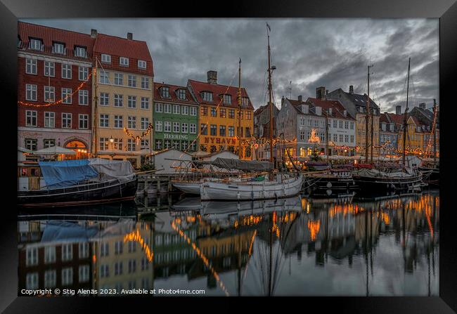 Christmas deocorations reflect in Copenhagen Nyhavn canal  Framed Print by Stig Alenäs
