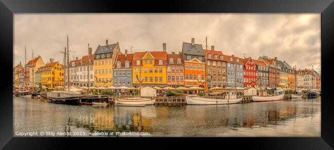 panorama of Nyhavn with colorful houses and boats moored at the  Framed Print by Stig Alenäs