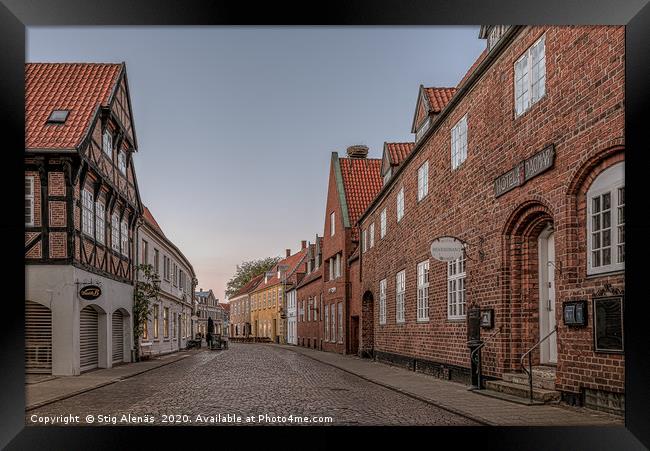 An old cobbled street in the medieval town of Ribe Framed Print by Stig Alenäs