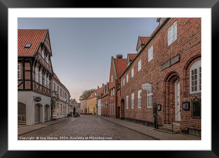 An old cobbled street in the medieval town of Ribe Framed Mounted Print by Stig Alenäs