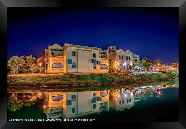 Egyptian houses at night reflecting in the lagoon Framed Print by Stig Alenäs