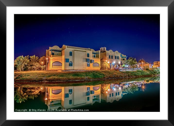Egyptian houses at night reflecting in the lagoon Framed Mounted Print by Stig Alenäs