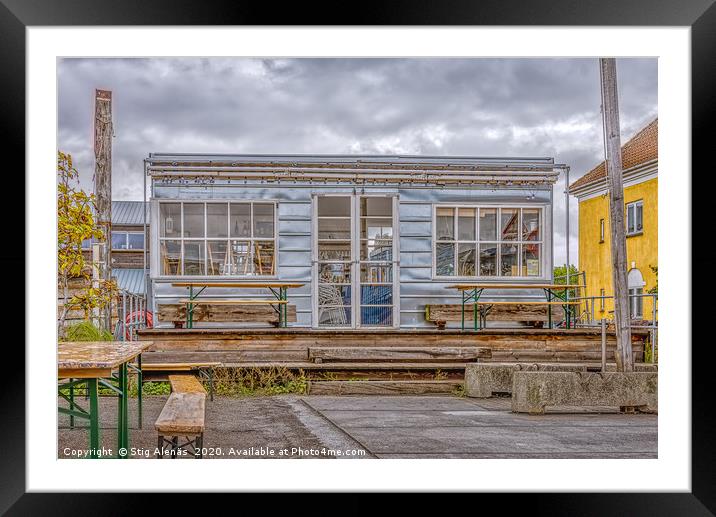 Colourful little Cafe with the furniture storaged  Framed Mounted Print by Stig Alenäs