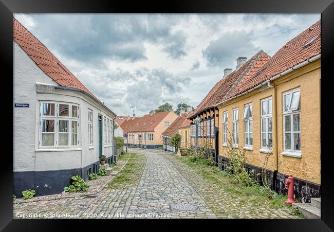 Picturesque street in an anciet alleyway in  Ebelt Framed Print by Stig Alenäs