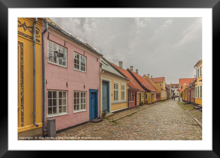  an idyllic street with cobblestone and colourful  Framed Mounted Print by Stig Alenäs