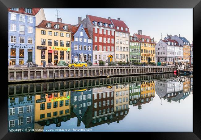 Reataurants on the quay of Nyhavn Canal reflecting Framed Print by Stig Alenäs