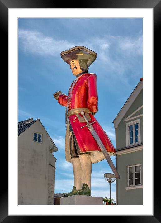 A soldier like whipping post  in the center of the danish town T Framed Mounted Print by Stig Alenäs