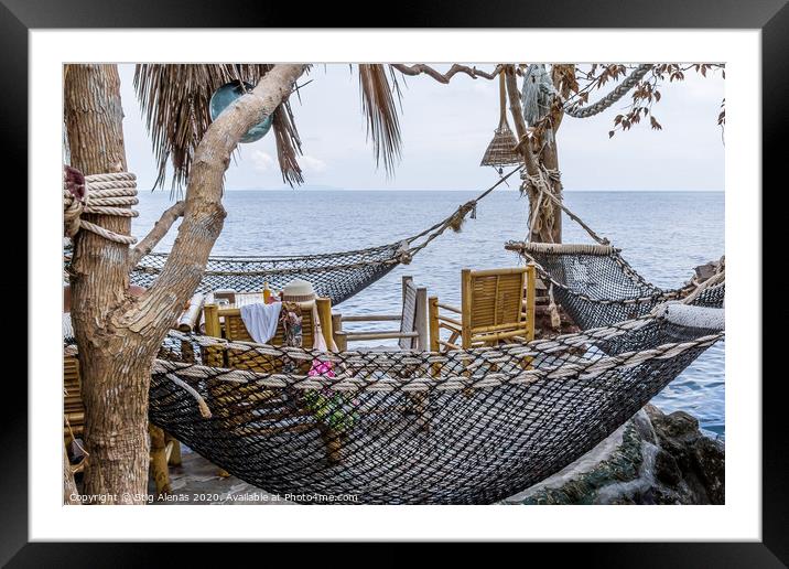 Tropical vintage  bar on a cliff over the ocean Framed Mounted Print by Stig Alenäs