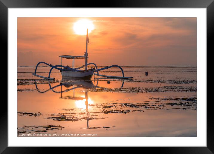 A traditional balinese fishing boat at sunrise Framed Mounted Print by Stig Alenäs