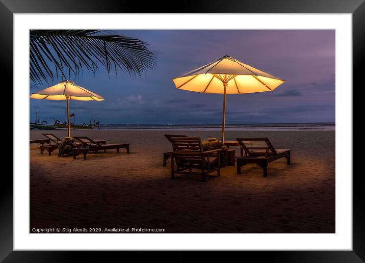 Umbrellas and sunbeds on the beach at night Framed Mounted Print by Stig Alenäs