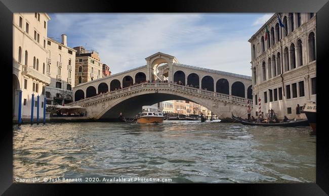 Venice Bridge view from a gondala. Framed Print by Josh Bennett