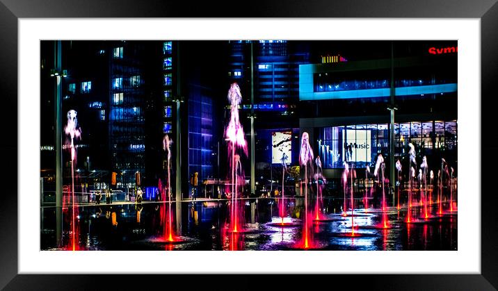 Water music, accompanied by neon brashness  Framed Mounted Print by Steve Taylor