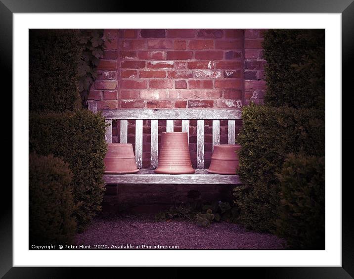 Secluded garden bench Framed Mounted Print by Peter Hunt