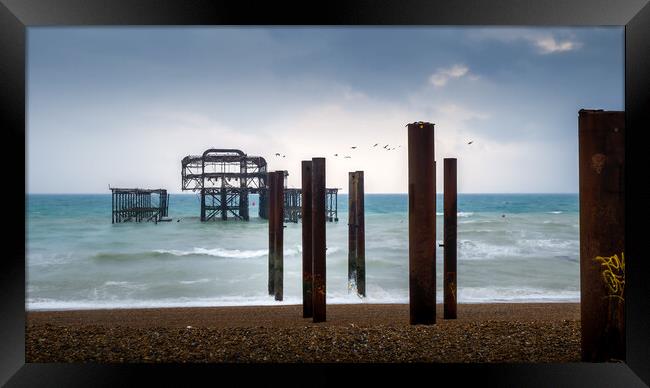 Brighton West Pier, Overcast Framed Print by Mark Jones