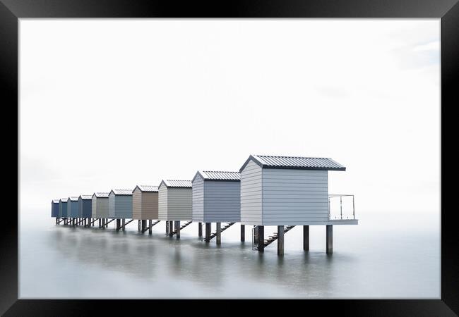 Osea Beach Huts Framed Print by Mark Jones