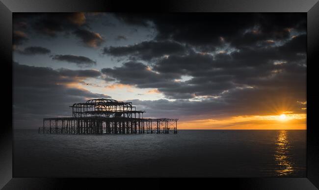 Brighton West Pier, Sunburst Framed Print by Mark Jones