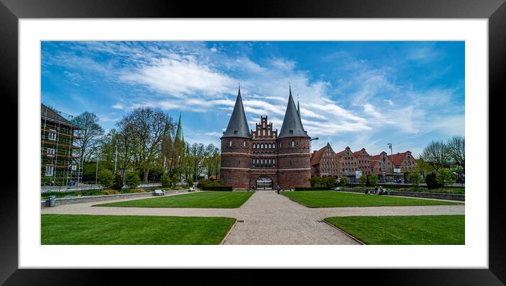 Famous Holsten Gate in the city of Lubeck Germany - CITY OF LUBECK, GERMANY - MAY 10, 2021 Framed Mounted Print by Erik Lattwein