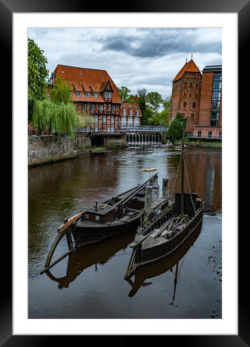 Beautiful old buildings in the historic city of Luneburg Germany - CITY OF LUENEBURG, GERMANY - MAY 10, 2021 Framed Mounted Print by Erik Lattwein