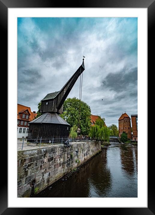 Old crane at the Historic city of Luneburg Germany - CITY OF LUENEBURG, GERMANY - MAY 10, 2021 Framed Mounted Print by Erik Lattwein