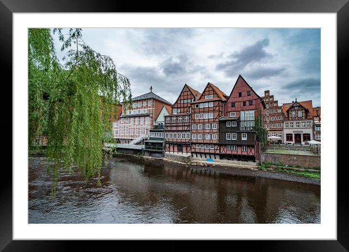 Beautiful old buildings in the historic city of Luneburg Germany - CITY OF LUENEBURG, GERMANY - MAY 10, 2021 Framed Mounted Print by Erik Lattwein