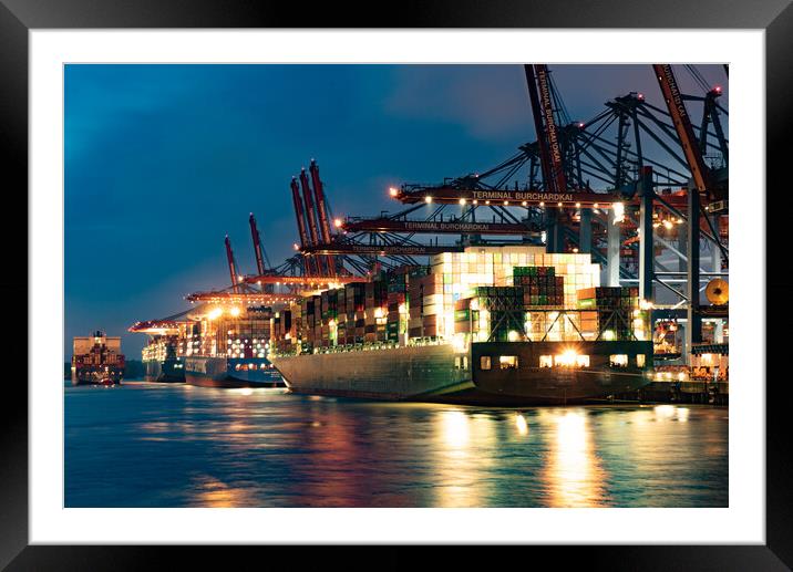 Port of Hamburg with its huge container terminals by night - CITY OF HAMBURG, GERMANY - MAY 10, 2021 Framed Mounted Print by Erik Lattwein