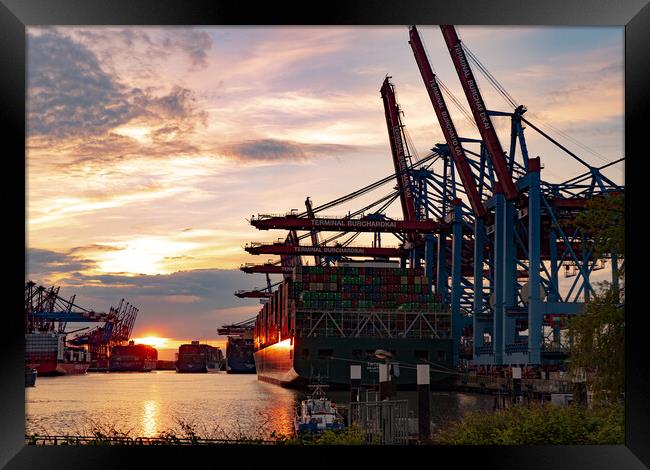 Sunset over the port of Hamburg - CITY OF HAMBURG, GERMANY - MAY 10, 2021 Framed Print by Erik Lattwein