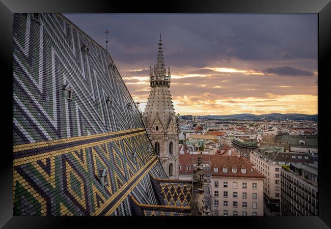 View over the city of Vienna from the top of St Stephans Cathedral Framed Print by Erik Lattwein