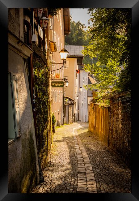Small lanes in the old town of Salzburg - SALZBURG, AUSTRIA, EUROPE - AUGUST 3, 2021 Framed Print by Erik Lattwein