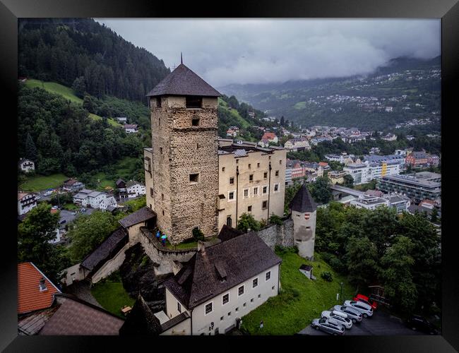 Landeck Castle in the Tyrolean village of Landeck in Austria - ISCHGL, AUSTRIA, EUROPE - AUGUST 5, 2021 Framed Print by Erik Lattwein