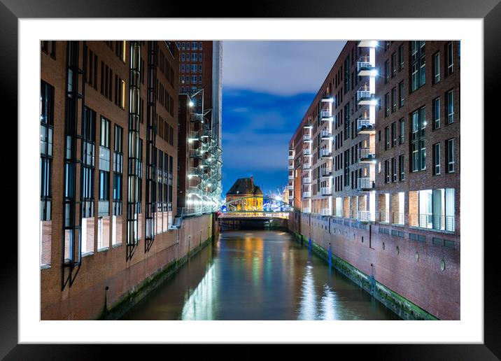 Wonderful warehouse district in Hamburg by night Framed Mounted Print by Erik Lattwein