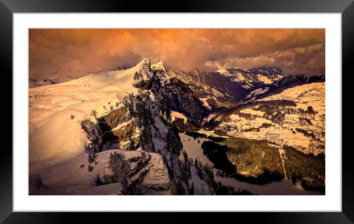 Flight over snow-capped mountains in the Swiss Alp Framed Mounted Print by Erik Lattwein