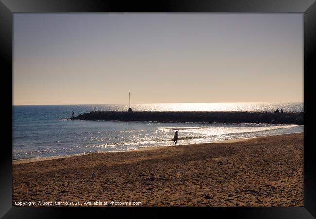 Against light of the beach of the Ribera de Sitges, Catalonia, S Framed Print by Jordi Carrio