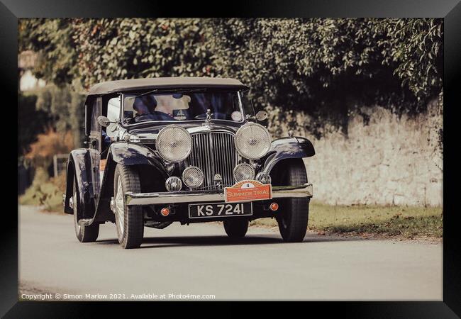 Classic Jaguar travelling through Hopton Castle Framed Print by Simon Marlow