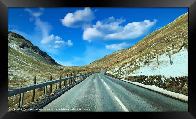 Driving through Snowdonia Framed Print by Simon Marlow