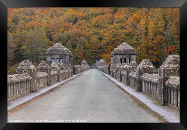 Autumn view across Lake Vyrnwy bridge Framed Print by Simon Marlow