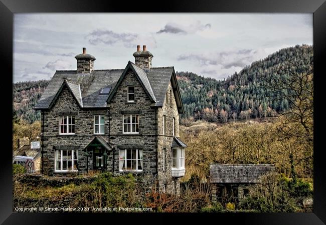 Cottage by the river in Betws-y-Coed, North Wales Framed Print by Simon Marlow