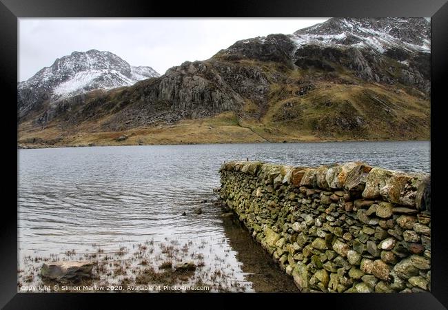 Majestic Llyn Idwal Peaceful Haven Amidst Snowdoni Framed Print by Simon Marlow