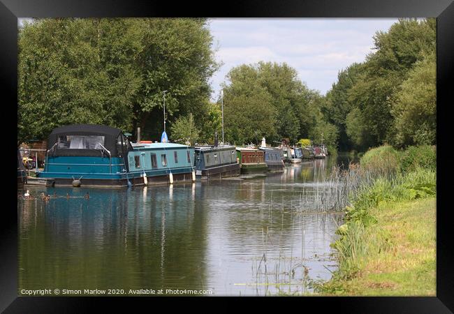 Barges moored on the Kennet and Avon Canal Framed Print by Simon Marlow